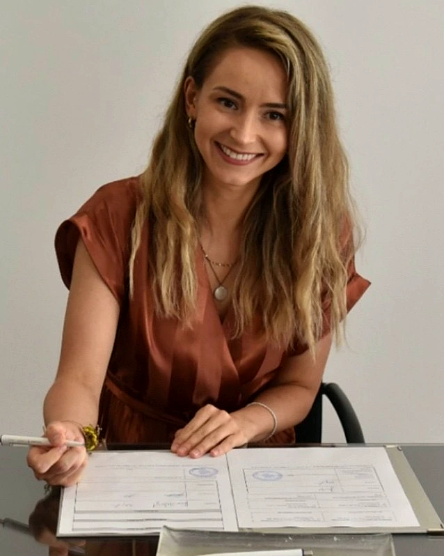 Austra Cukura, product designer, at her desk